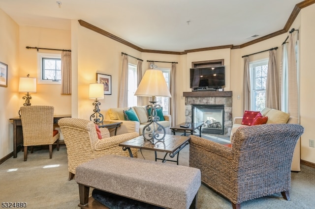 living room with a fireplace, light colored carpet, plenty of natural light, and ornamental molding