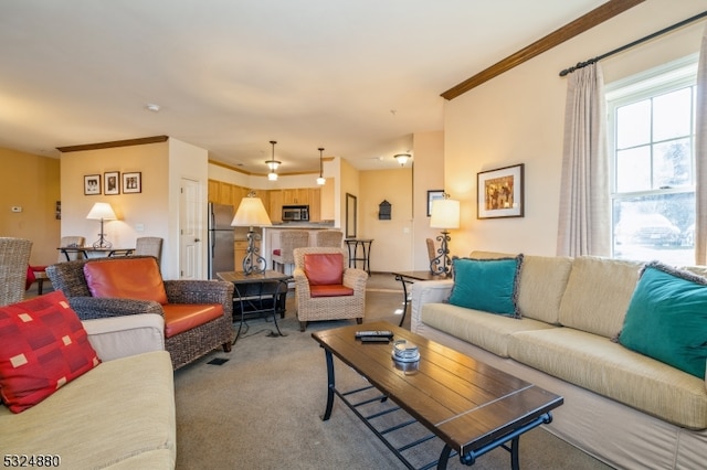 living room featuring light colored carpet and crown molding