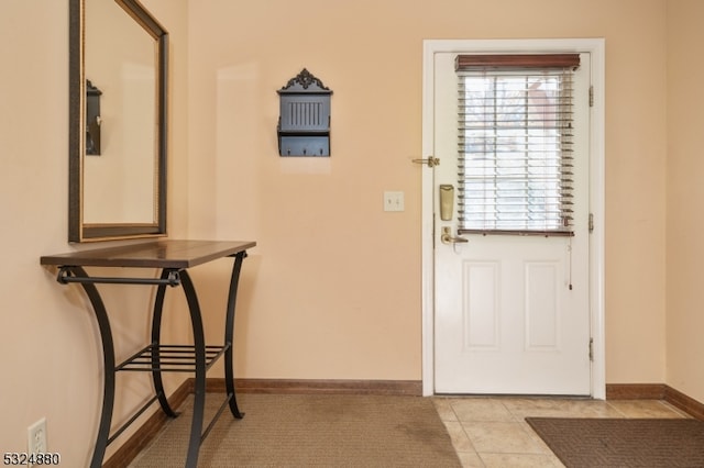 entryway featuring light tile patterned floors