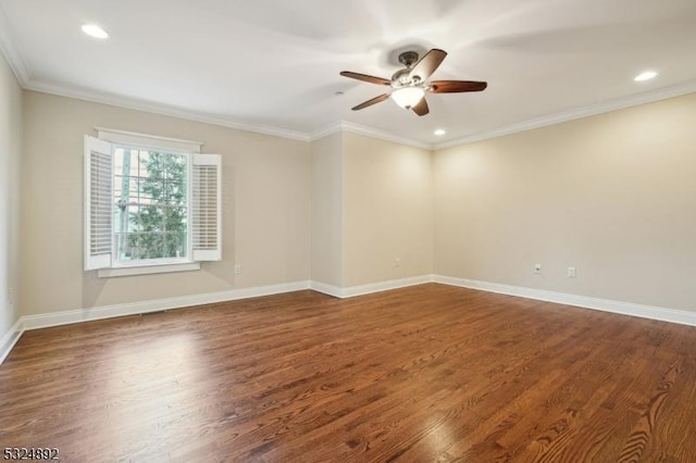 empty room with crown molding, recessed lighting, ceiling fan, wood finished floors, and baseboards