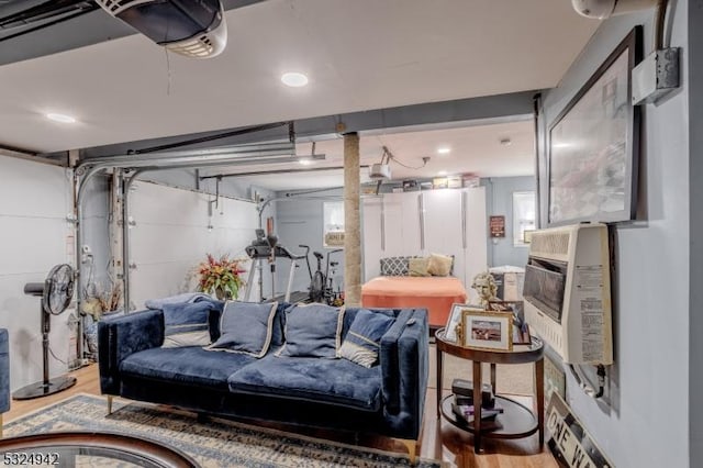 living room featuring a fireplace and light wood-type flooring