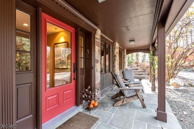 entrance to property with a porch