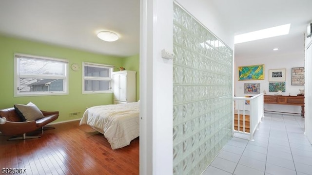 bedroom featuring light tile patterned floors