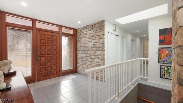 view of tiled foyer entrance