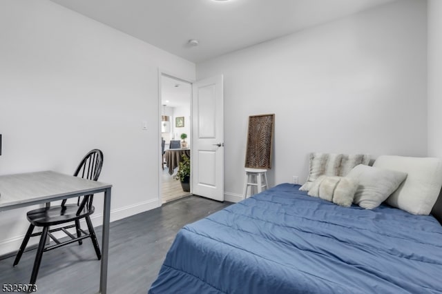 bedroom featuring dark hardwood / wood-style floors