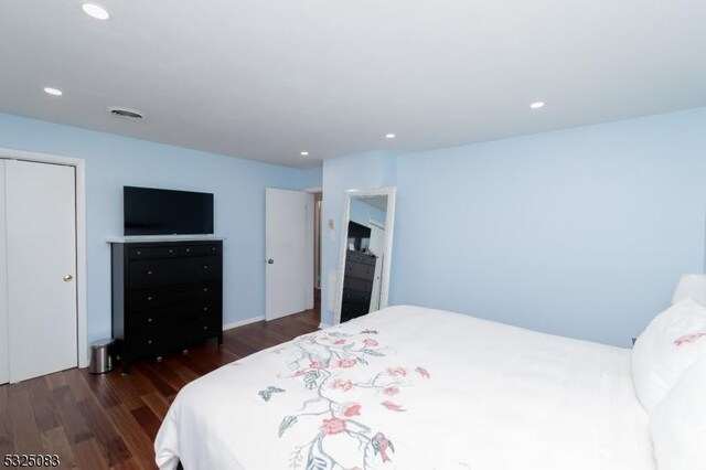 203 E Main St, Prospect Park Boro, NJ 07508 - bedroom with wood finished floors and recessed lighting