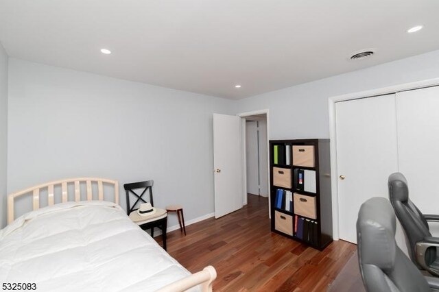 203 E Main St, Prospect Park Boro, NJ 07508 - bedroom with wood finished floors, recessed lighting, a closet, and baseboards