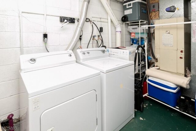 203 E Main St, Prospect Park Boro, NJ 07508 - laundry room featuring independent washer and dryer and concrete block wall