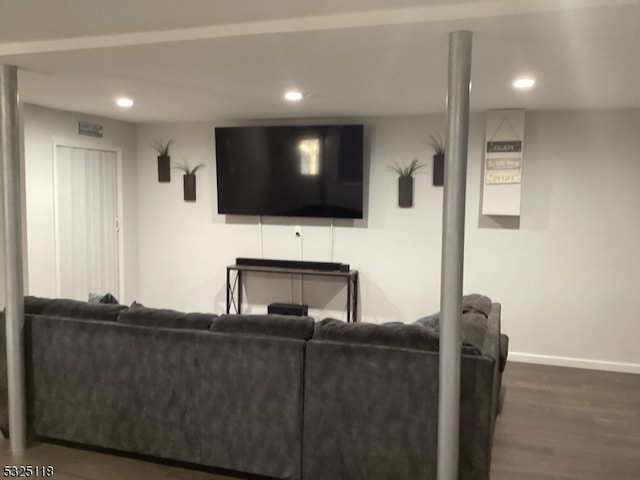 living room featuring dark hardwood / wood-style flooring