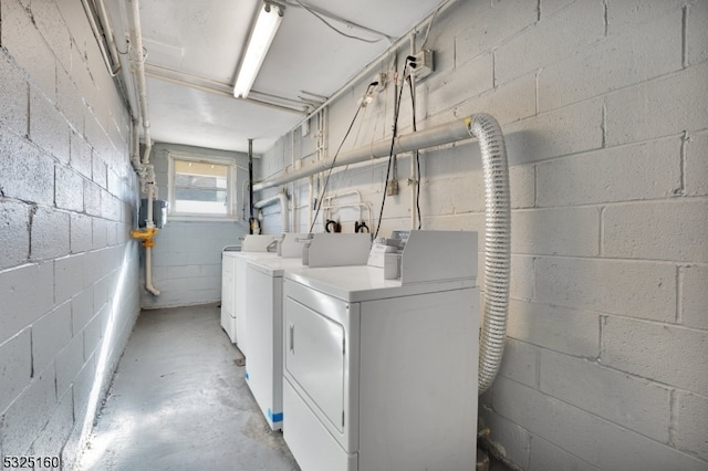 washroom featuring washer and dryer