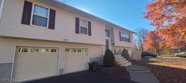 view of property exterior with a garage