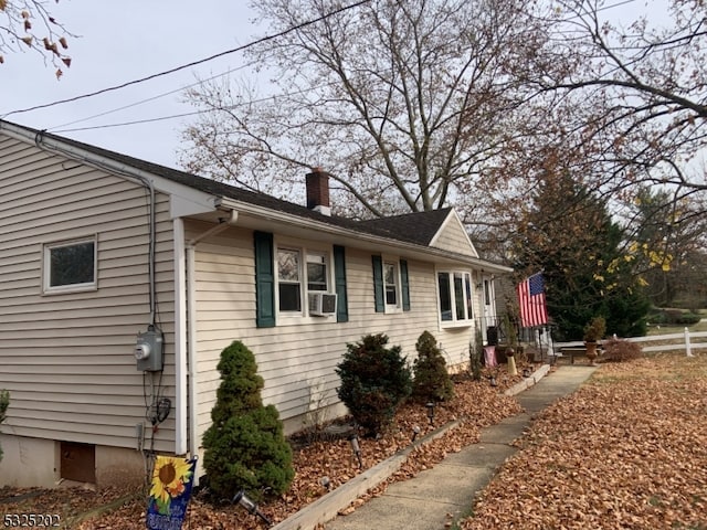 view of home's exterior featuring cooling unit