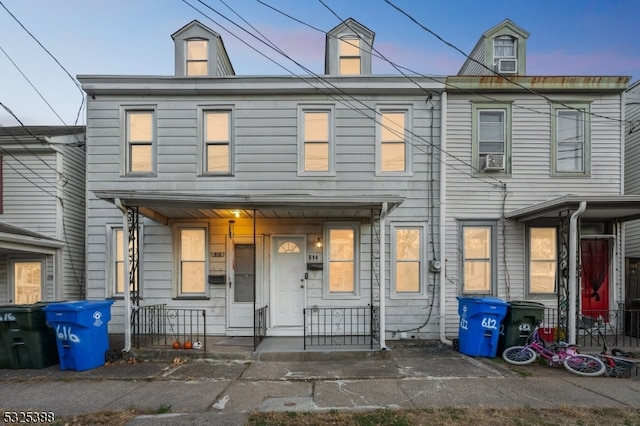 view of property with covered porch