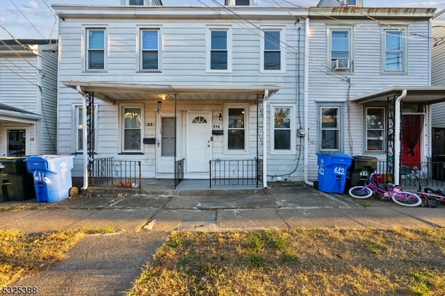 view of property featuring a porch