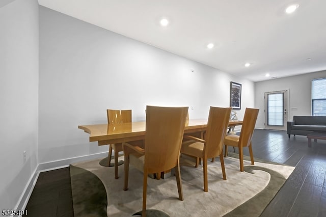 dining area featuring dark hardwood / wood-style flooring