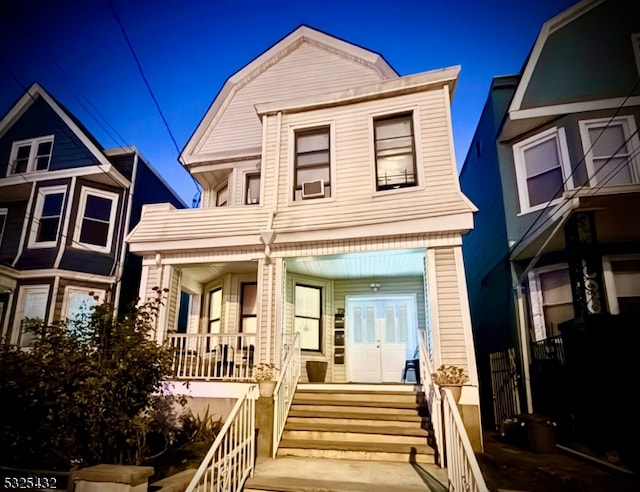 multi unit property featuring covered porch