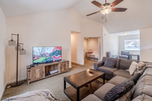 living room with ceiling fan, light colored carpet, and high vaulted ceiling