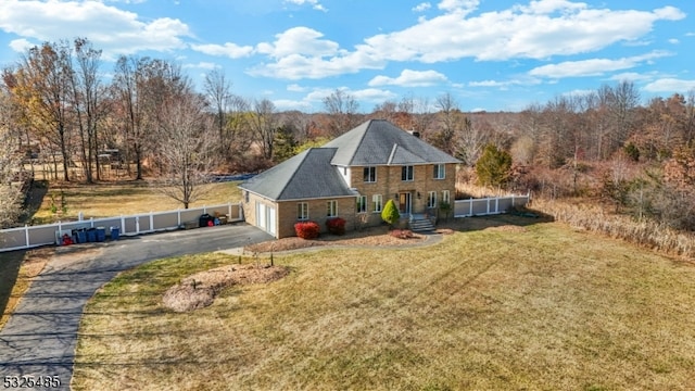 view of front of home with a front lawn