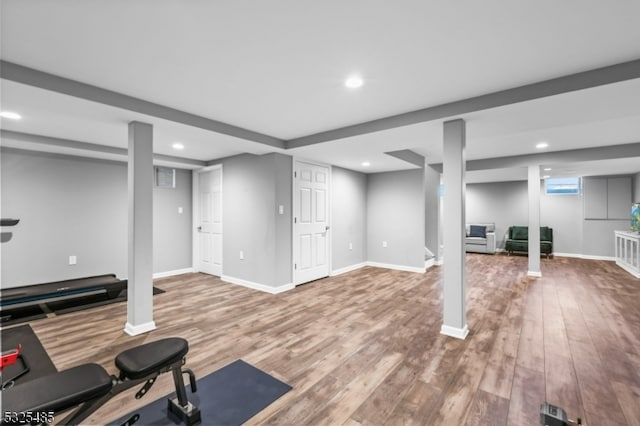 exercise area with hardwood / wood-style flooring