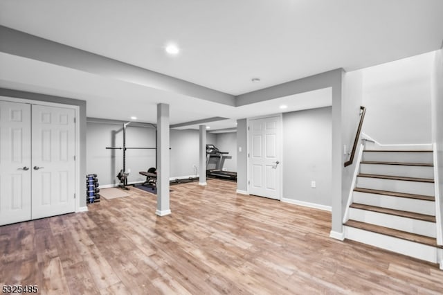 basement featuring light hardwood / wood-style floors