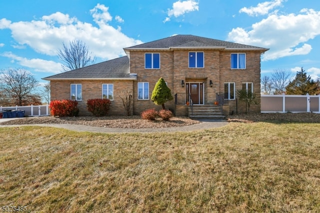 view of front of home featuring a front yard