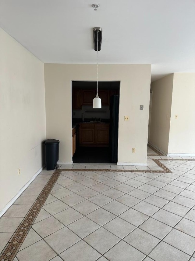 interior space featuring light tile patterned flooring