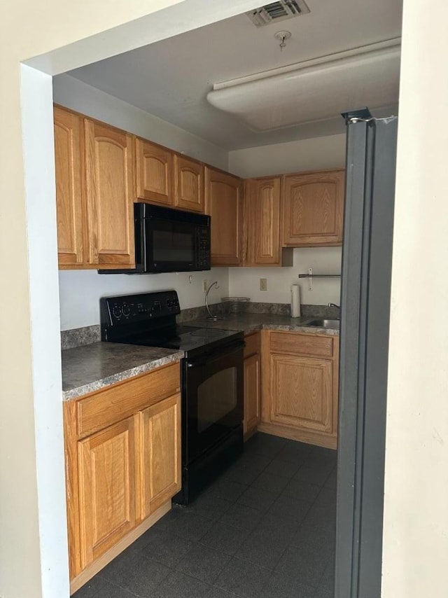 kitchen with black appliances