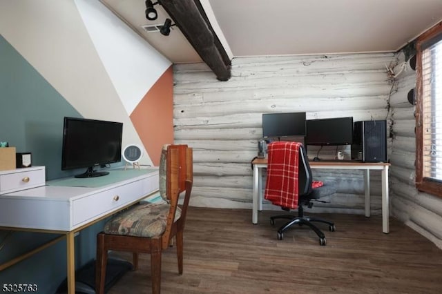 office area with beamed ceiling, wood finished floors, and visible vents