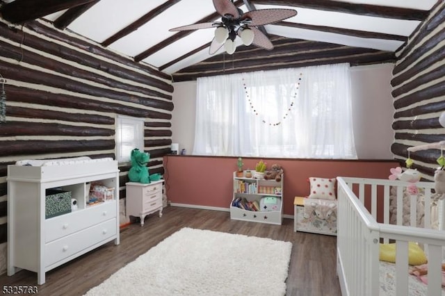 bedroom featuring lofted ceiling and dark wood-style flooring