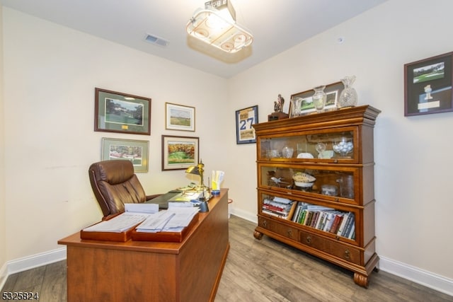 home office featuring hardwood / wood-style floors