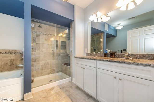 bathroom with plus walk in shower and vanity