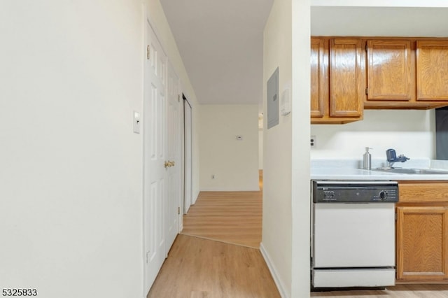 hall featuring light wood-type flooring and sink