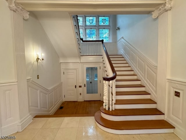 staircase with tile patterned flooring