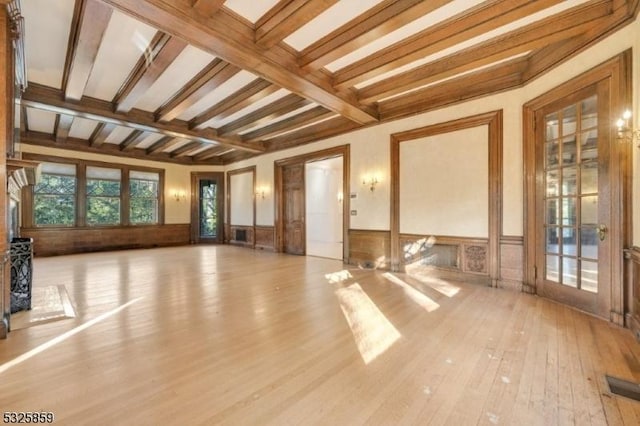 26 Ridge Rd, Summit City, NJ 07901 - unfurnished living room with wood finished floors, beam ceiling, and wainscoting