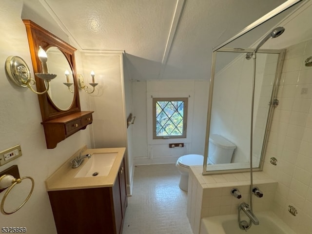 full bathroom with vanity, toilet, tiled shower / bath, and lofted ceiling