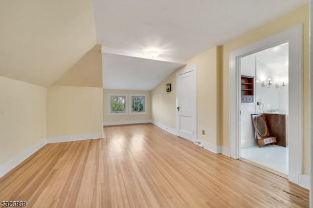 26 Ridge Rd, Summit City, NJ 07901 - additional living space featuring light wood-style floors, vaulted ceiling, and baseboards