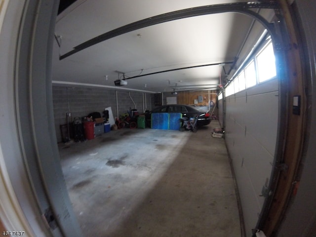 garage featuring a garage door opener