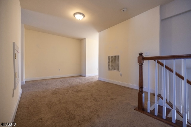 hallway with carpet