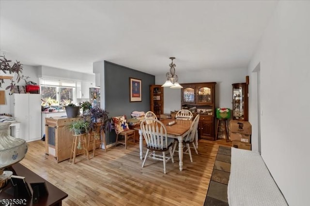 dining room featuring light hardwood / wood-style floors