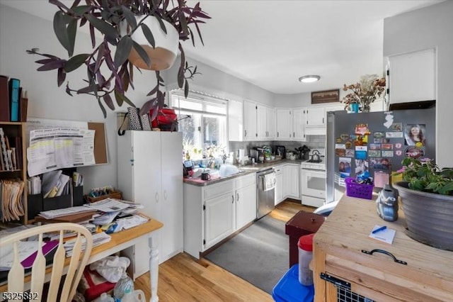 kitchen with dishwasher, white cabinets, white range, decorative backsplash, and light hardwood / wood-style floors