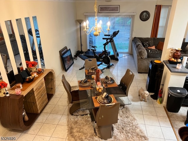 tiled dining area featuring a chandelier