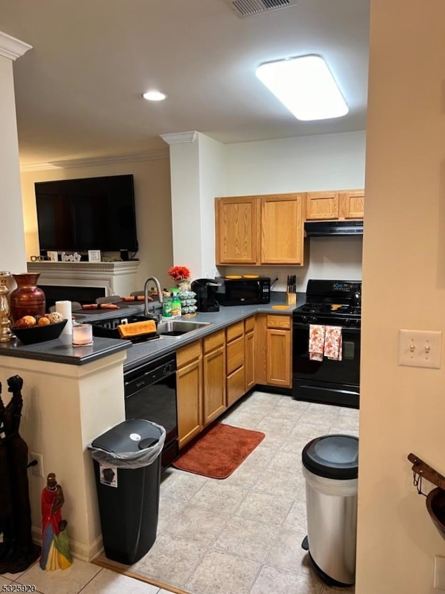 kitchen with kitchen peninsula, sink, crown molding, and black appliances