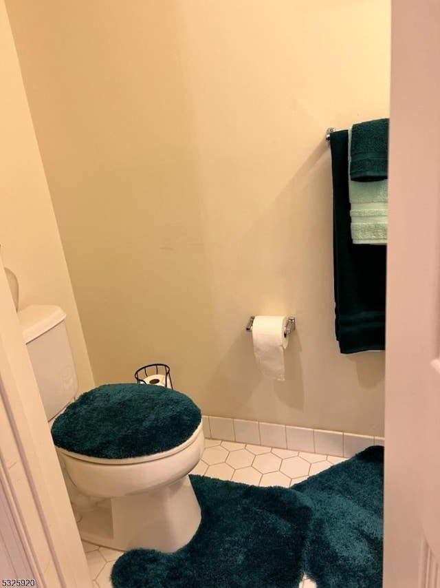 bathroom with tile patterned floors and toilet