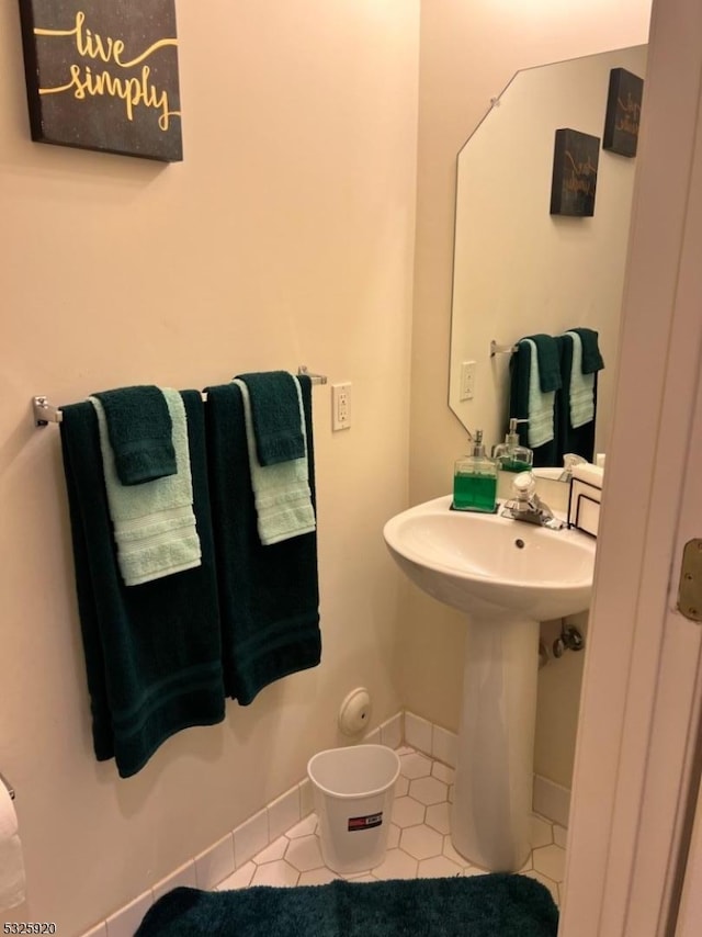 bathroom featuring tile patterned floors and sink