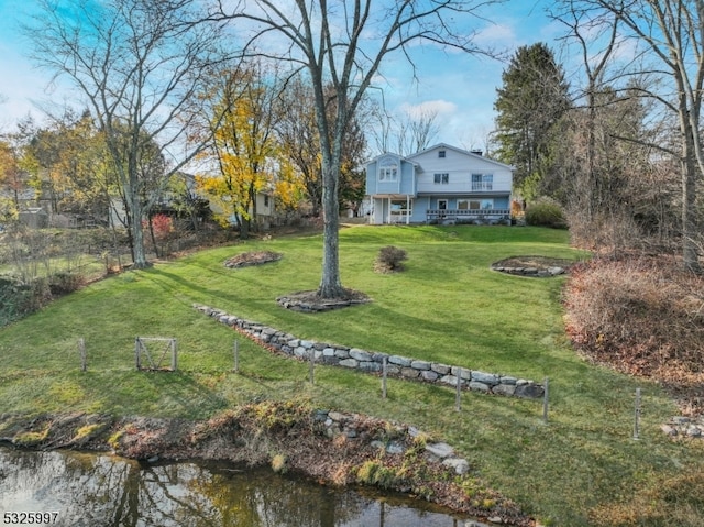 view of yard featuring a water view