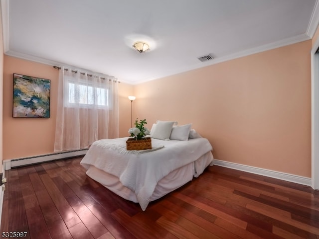 bedroom with dark wood-type flooring, a baseboard radiator, and ornamental molding