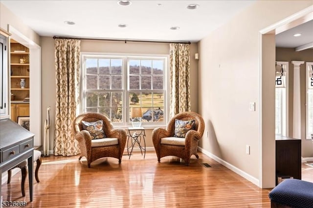 sitting room with light wood-type flooring