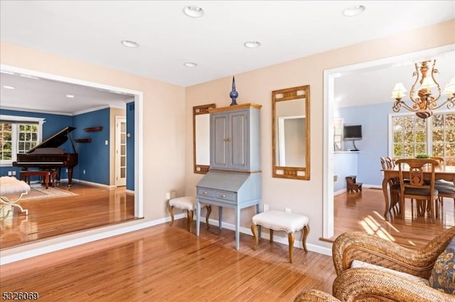 interior space featuring hardwood / wood-style floors and a notable chandelier