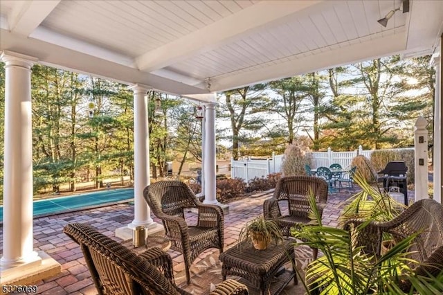 view of patio featuring a grill