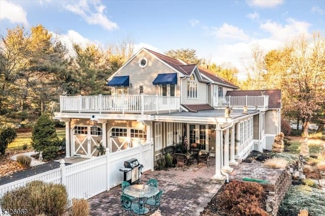 rear view of house featuring a patio